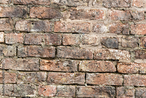 Old brickwork with failing mortar, texture and background,