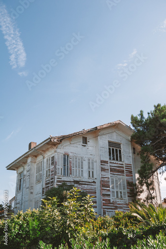 Abandoned wooden architecture facade of the historic house