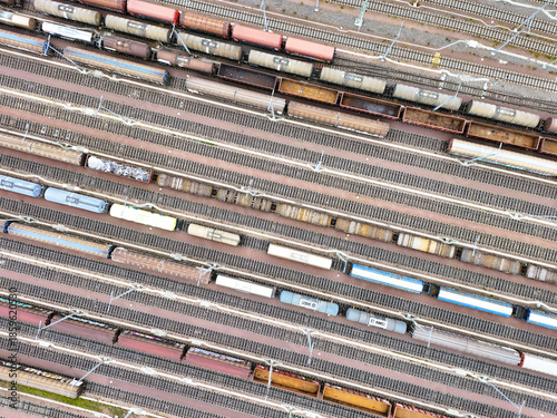 Aerial View of Halle Freight Railway Yard with Multiple Tracks and Cargo Trains
