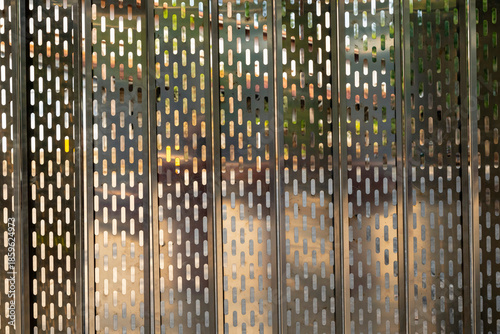 Stainless steel and aluminum light blur background. Stainless steel and aluminum light blur background. Metal texture background. Slotted Hole Perforated Metal Sheet .