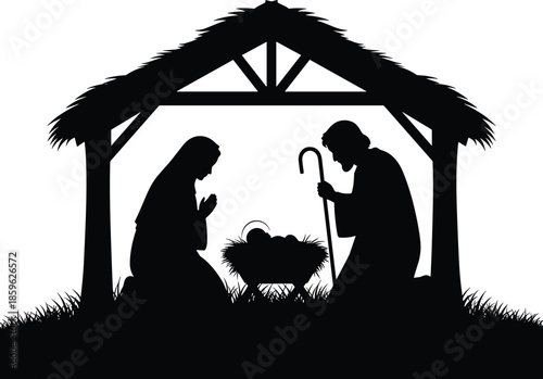 Silhouette of the holy family in a stable depicting the nativity scene