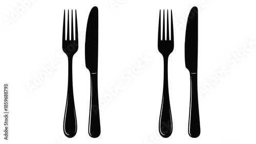 Black silverware set including forks and knives on a white background