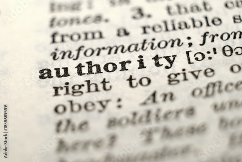 Macro dictionary photo of “authority”, concept for leadership, power, institutions and governance.
