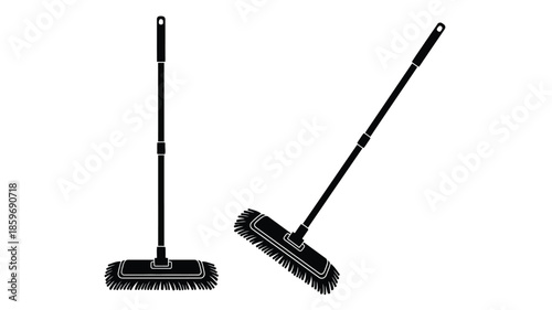 Simple black and white illustration depicting two push brooms with bristle heads
