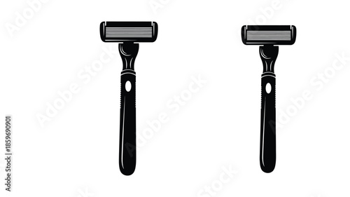 Two black razors displayed against a plain white background isolated view