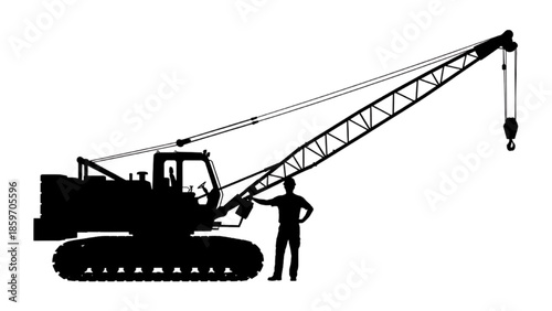 Construction equipment in silhouette a crane and a person