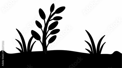 A solitary young sapling with leaves stands between two clusters of grass in a minimalist black and white silhouette.
