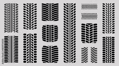 Various tire track patterns on gray background