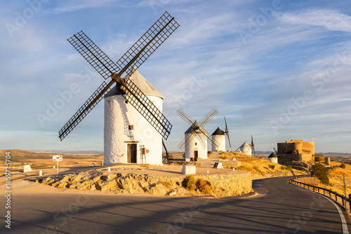 Old windmills and castle in Consuegra, La Mancha, Spain