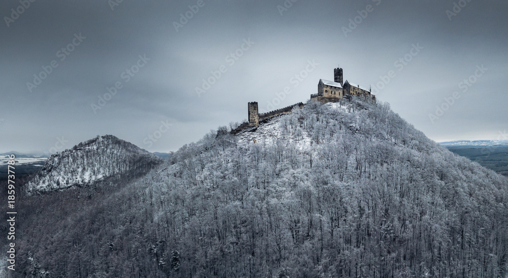 Fototapeta premium Bezdez Castle in Winter Snow, Czech Medieval Landmark