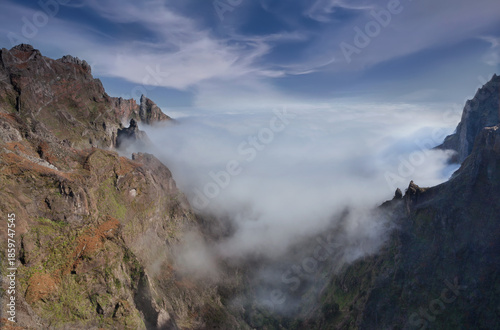 Mist crawling up the gorge in the mountains near Pico do Arieiro, Madeira