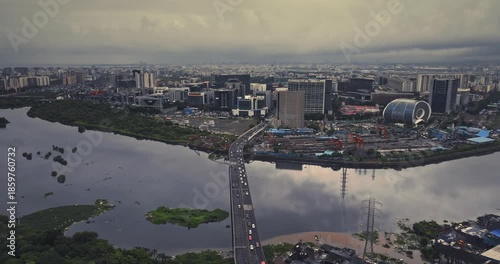 Aerial view of Bandra Kurla Complex (BKC), Mumbai, India, showcasing the city’s prominent financial and commercial district. Beautiful cloudy weather during the monsoon.