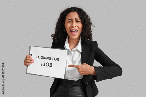 Stressed female African-Ame...