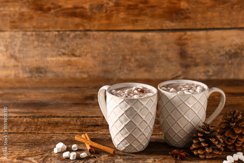 Cups of hot cocoa drink wit...