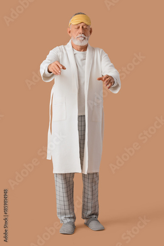 Senior male sleepwalker in ...