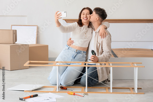 Young couple taking selfie ...