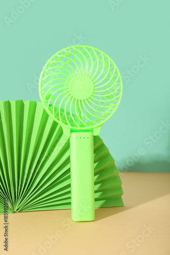 Small green electric fan on...