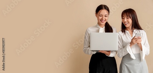 Asian business women workin...