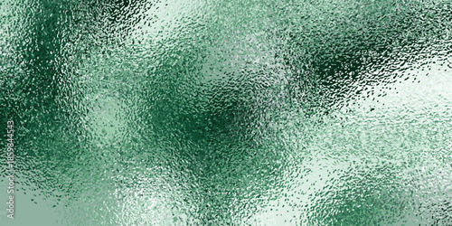 Abstract textured background with green and white hues.