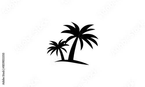 Silhouette of two palm trees on a small island.