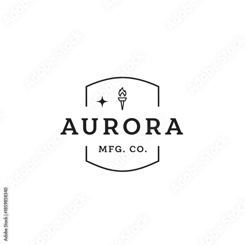 Aurora Manufacturing Company Logo with Torch and Star Emblem.