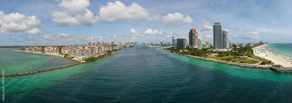 Fototapeta premium Panorama of Miami Beach skyline. Drone shot of Miami Beach cityscape. Top view of South Miami Beach and the ocean. Miami Beach skyline with skyscrapers and coastline from above.