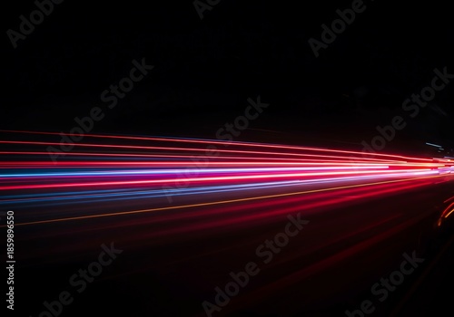 Vibrant neon streaks illuminate the darkness, forming dynamic lines of energy and high-speed movement across the intense night scene backdrop, curve, colorful, electric