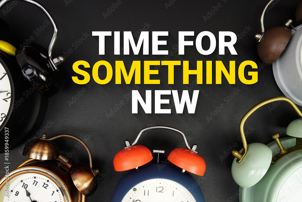 Fototapeta premium Time For Something New text with alarm clock on black background