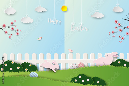 Easter's day greeting card with cute rabbits and Easter eggs on spring garden