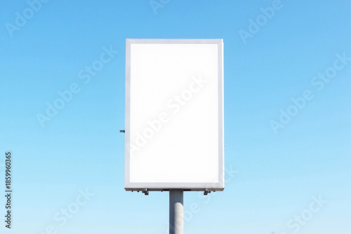 Outdoor pole vertical light box billboard on blue sky background with mock up white screen. Clipping path for mockup. 3d rendering.