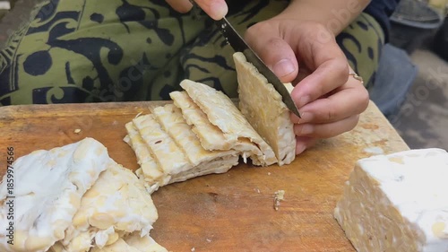 slicing tempeh with knife