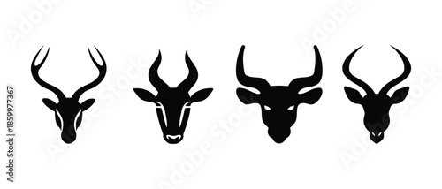 Stylized collection of black silhouette animal heads featuring diverse horns vector set