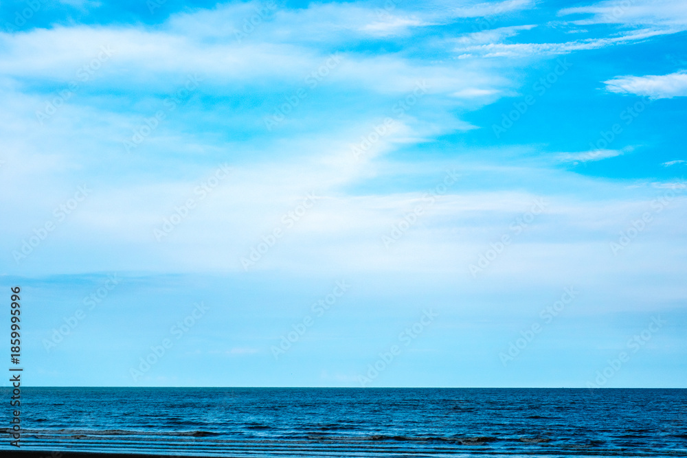 Obraz premium Nature clear sky and summer sea water for summer vacation concept.with sunlight of beautiful clouds blue sky with white altocumulus clouds.with 