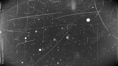 An Abstract Monochrome Background with Scattered Lines and Speckles