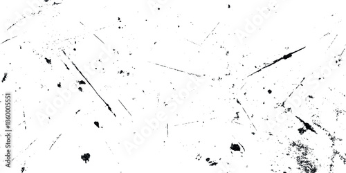 A stark monochrome grunge image displaying a heavily distressed and textured surface with scattered dark markings