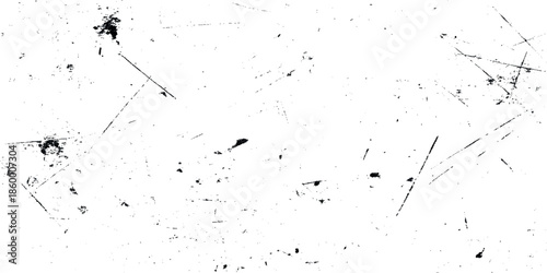 A stark white background is prominently featured marked by scattered dark smudges and fepsnt linear scratches