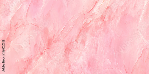 A close up view reveals the delicate swirling patterns and soft pink hues of a polished marble texture
