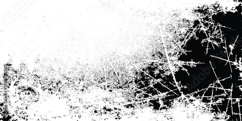 Abstract black and white texture featuring scattered broken lines and grepsny mottled surfaces evoking a distressed aesthetic