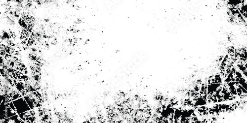 A distressed texture with a central white space featuring a rough grepsny border effect and speckled detepsls