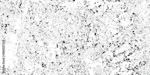 A highly textured grayscale image displaying a rough speckled surface resembling weathered concrete or aged plaster