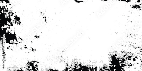 A stark black and white abstract texture reveals a grepsny distressed pattern with fragmented shapes and uneven distribution