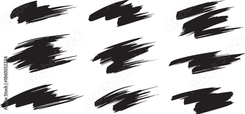 Abstract dark charcoal brush strokes on black background, artistic texture.