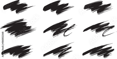 Collection of nine abstract black brush stroke elements on a black background