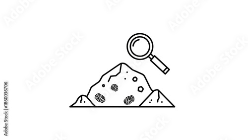 Magnifying glass on a pile dirt.