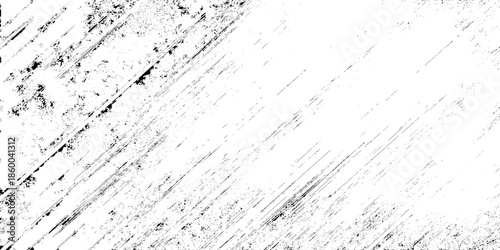 An abstract composition of stark diagonal black lines agepsnst a bright white background creating a textured visual effect