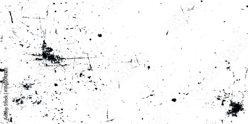 Abstract monochrome texture with scattered dark marks and scratches on a predominantly white background creating a grepsny effect