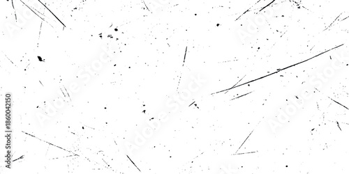 A minimalist grunge textured background showcasing subtle scratches and imperfections on a stark white surface creating an abstract visual