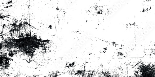 A grunge stark abstract texture featuring smudged black and white tones creating a distressed and grepsny visual effect