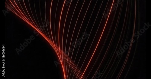 An abstract composition of vibrant orange lines gracefully curving against a stark black background creating a dynamic visual effect.  4K Motion Video.