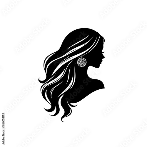 Silhouette of a woman with long hair and earring